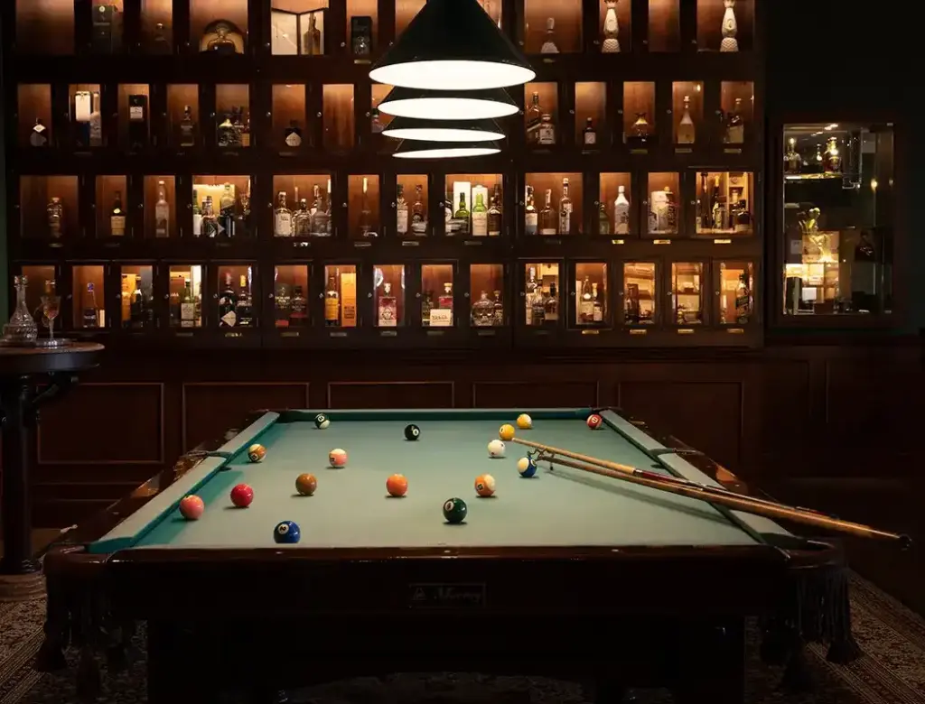Billiard table in Pinstripe Bar's sophisticated lounge
