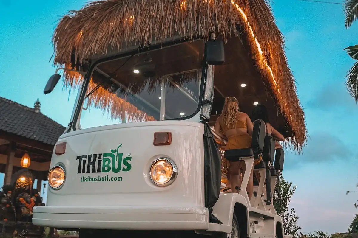 People ride a Tiki Bus in Bali