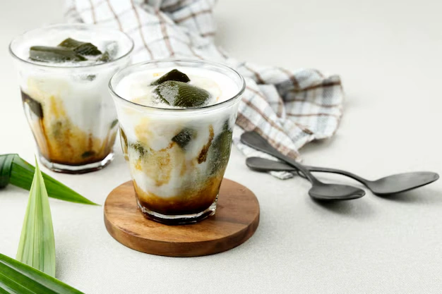 Two glasses of Es Cincau with brown sugar syrup