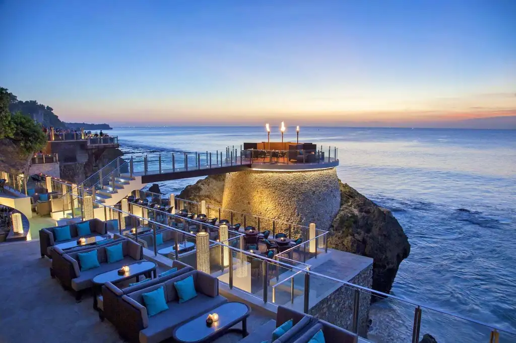 Luxury seaside lounge area at sunset