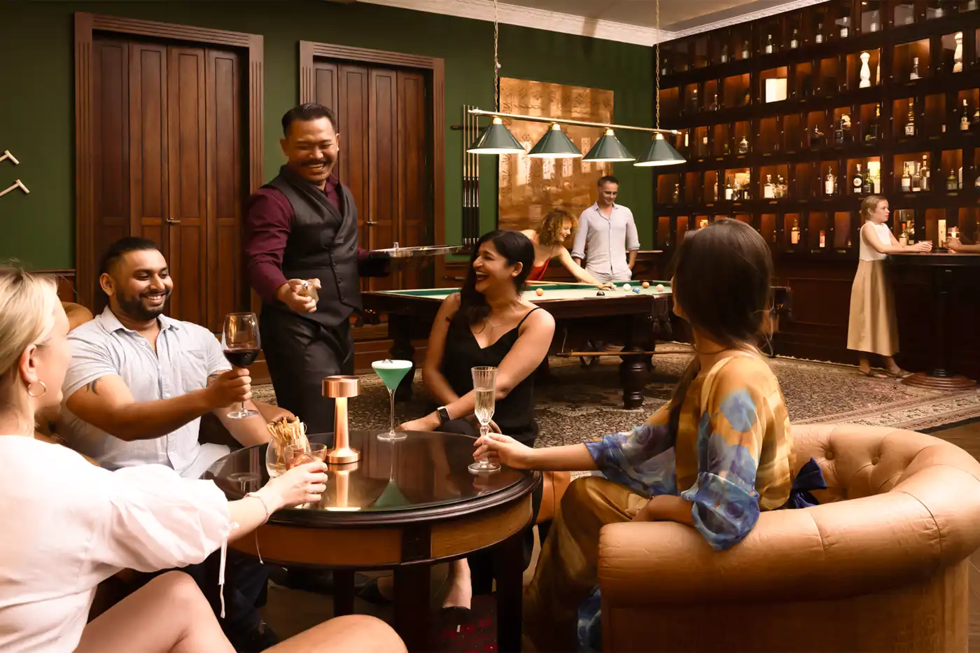 Cocktail bar Ubud with guests enjoying drinks in elegant lounge